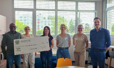 Remise d'un chèque par l'association Neurovie à l'équipe de Pr Adotevi